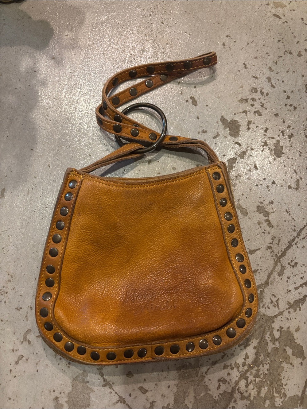 Never Mind Tan Leather Studded clutch bag